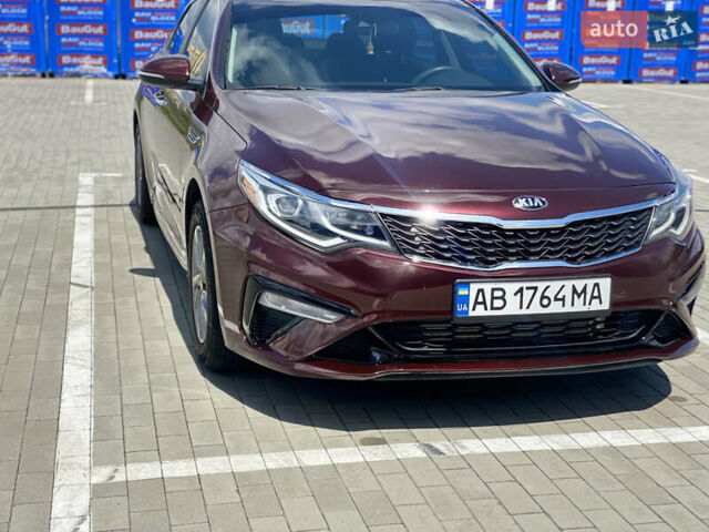 Красный Киа Оптима, объемом двигателя 2.36 л и пробегом 107 тыс. км за 13600 $, фото 1 на Automoto.ua