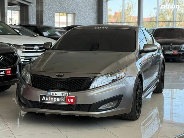Серый Киа Оптима, объемом двигателя 2 л и пробегом 238 тыс. км за 10440 $, фото 1 на Automoto.ua