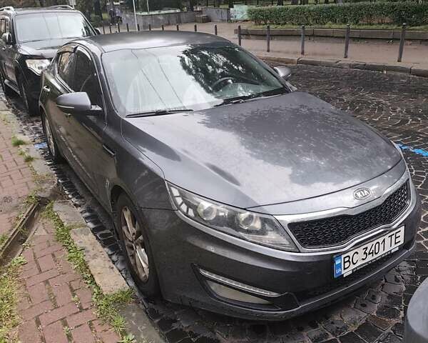 Сірий Кіа Оптіма, об'ємом двигуна 2 л та пробігом 205 тис. км за 10500 $, фото 1 на Automoto.ua