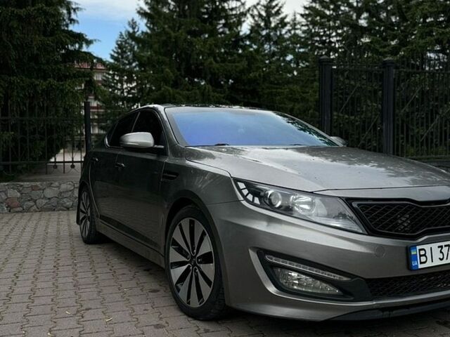 Серый Киа Оптима, объемом двигателя 2 л и пробегом 160 тыс. км за 10300 $, фото 1 на Automoto.ua