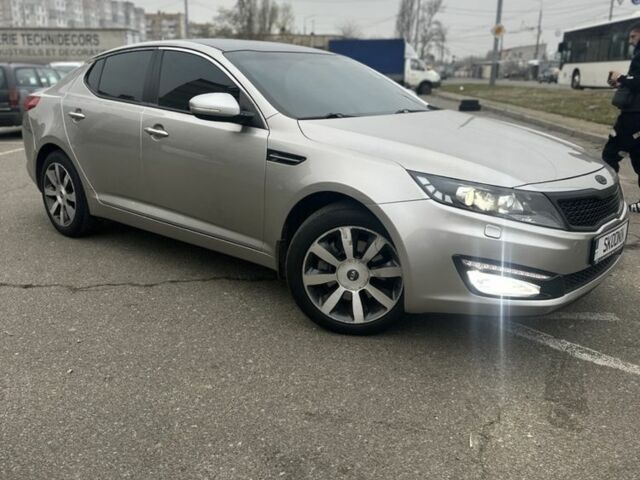 Серый Киа Оптима, объемом двигателя 2 л и пробегом 243 тыс. км за 10500 $, фото 1 на Automoto.ua