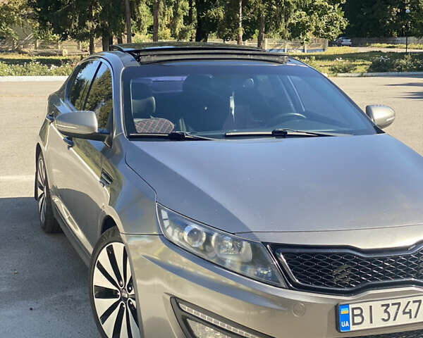 Серый Киа Оптима, объемом двигателя 2 л и пробегом 265 тыс. км за 10400 $, фото 1 на Automoto.ua