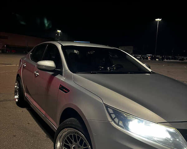 Серый Киа Оптима, объемом двигателя 2 л и пробегом 195 тыс. км за 10700 $, фото 1 на Automoto.ua