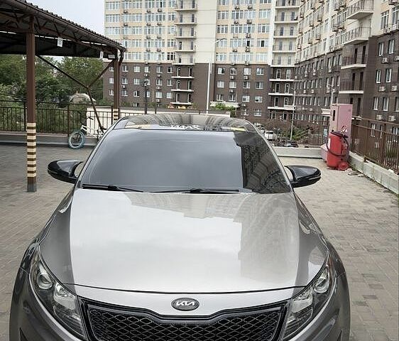 Сірий Кіа Оптіма, об'ємом двигуна 2 л та пробігом 256 тис. км за 8922 $, фото 1 на Automoto.ua