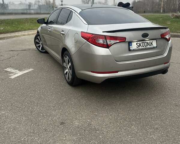 Серый Киа Оптима, объемом двигателя 2 л и пробегом 245 тыс. км за 10500 $, фото 1 на Automoto.ua