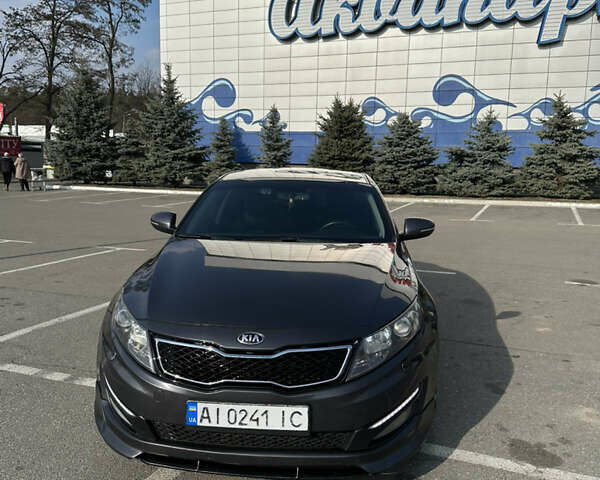 Серый Киа Оптима, объемом двигателя 2 л и пробегом 187 тыс. км за 10100 $, фото 1 на Automoto.ua