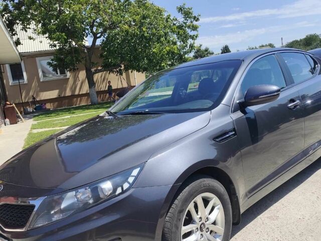 Серый Киа Оптима, объемом двигателя 2 л и пробегом 150 тыс. км за 10000 $, фото 1 на Automoto.ua