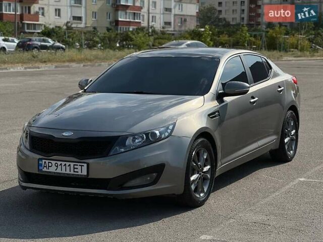 Сірий Кіа Оптіма, об'ємом двигуна 2.36 л та пробігом 190 тис. км за 7777 $, фото 1 на Automoto.ua