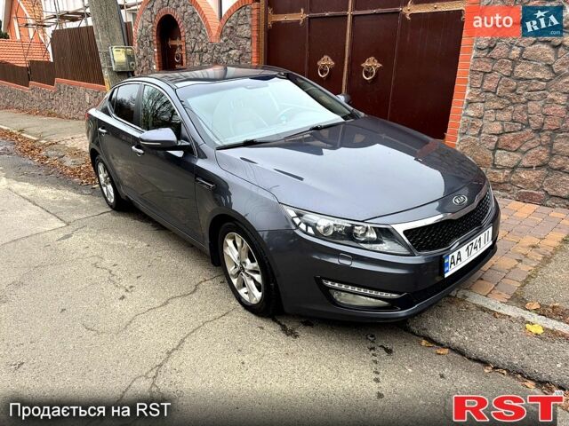 Серый Киа Оптима, объемом двигателя 2 л и пробегом 211 тыс. км за 10000 $, фото 1 на Automoto.ua