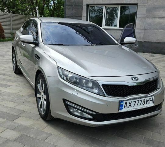 Серый Киа Оптима, объемом двигателя 2 л и пробегом 320 тыс. км за 10700 $, фото 1 на Automoto.ua