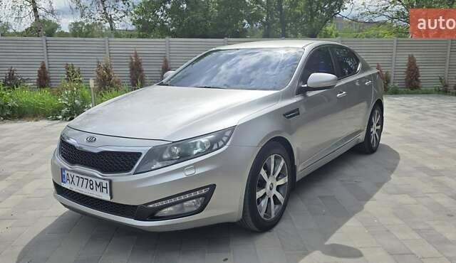 Серый Киа Оптима, объемом двигателя 2 л и пробегом 308 тыс. км за 11300 $, фото 1 на Automoto.ua