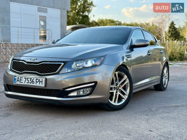 Серый Киа Оптима, объемом двигателя 2 л и пробегом 168 тыс. км за 10450 $, фото 1 на Automoto.ua