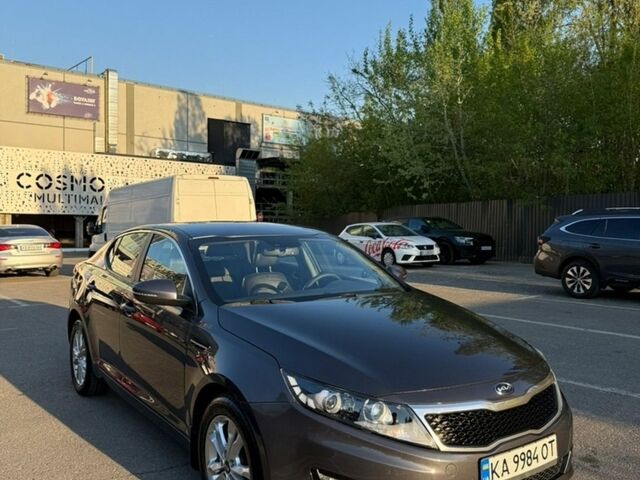 Сірий Кіа Оптіма, об'ємом двигуна 2 л та пробігом 214 тис. км за 10500 $, фото 1 на Automoto.ua