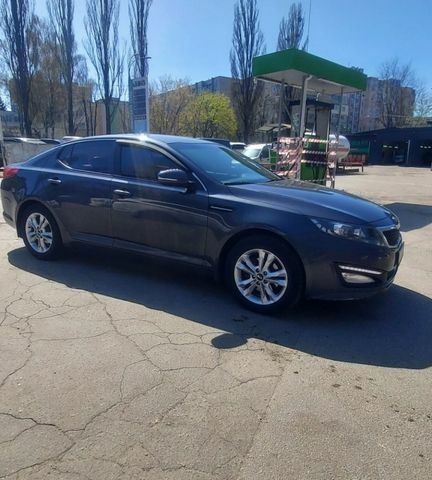 Сірий Кіа Оптіма, об'ємом двигуна 1.7 л та пробігом 257 тис. км за 6800 $, фото 1 на Automoto.ua