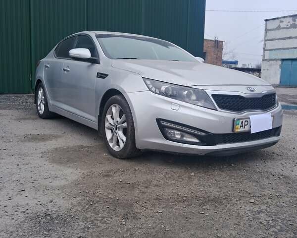 Серый Киа Оптима, объемом двигателя 2 л и пробегом 323 тыс. км за 9300 $, фото 1 на Automoto.ua