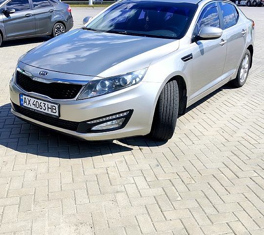 Серый Киа Оптима, объемом двигателя 2 л и пробегом 249 тыс. км за 9800 $, фото 1 на Automoto.ua