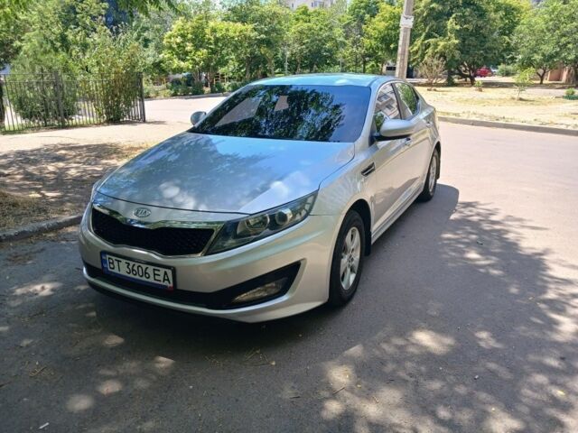 Серый Киа Оптима, объемом двигателя 2 л и пробегом 299 тыс. км за 7007 $, фото 1 на Automoto.ua