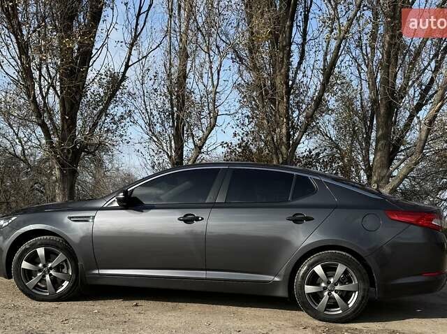 Серый Киа Оптима, объемом двигателя 2 л и пробегом 277 тыс. км за 9200 $, фото 1 на Automoto.ua