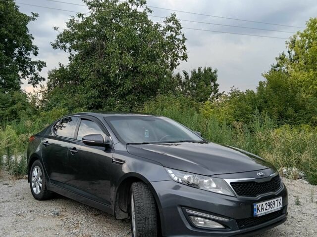 Сірий Кіа Оптіма, об'ємом двигуна 1.7 л та пробігом 300 тис. км за 11032 $, фото 1 на Automoto.ua