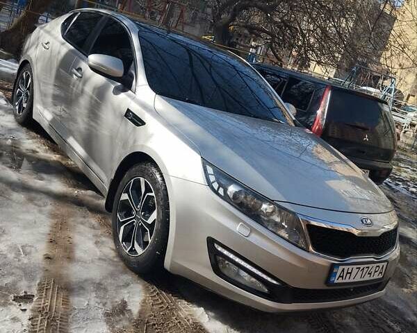Сірий Кіа Оптіма, об'ємом двигуна 2 л та пробігом 150 тис. км за 10999 $, фото 1 на Automoto.ua