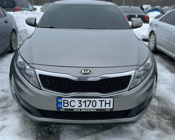 Сірий Кіа Оптіма, об'ємом двигуна 2.36 л та пробігом 240 тис. км за 8800 $, фото 1 на Automoto.ua