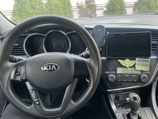 Серый Киа Оптима, объемом двигателя 2 л и пробегом 179 тыс. км за 7200 $, фото 1 на Automoto.ua