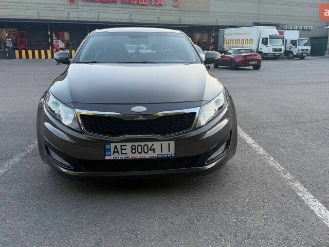 Сірий Кіа Оптіма, об'ємом двигуна 2.36 л та пробігом 196 тис. км за 9500 $, фото 1 на Automoto.ua