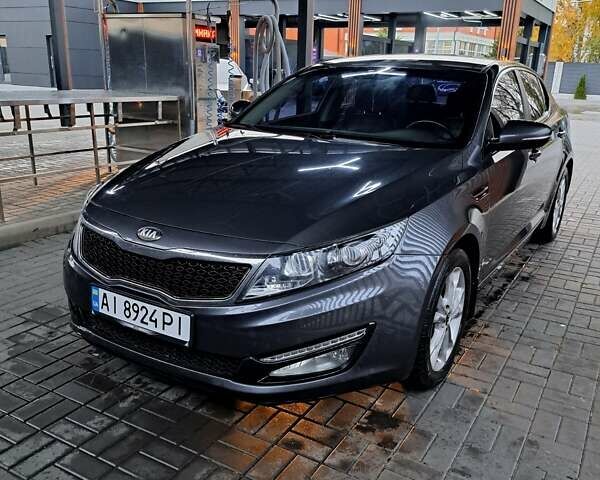 Серый Киа Оптима, объемом двигателя 2 л и пробегом 147 тыс. км за 10600 $, фото 1 на Automoto.ua