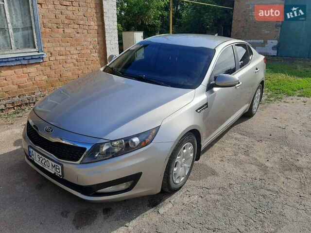Серый Киа Оптима, объемом двигателя 2.4 л и пробегом 138 тыс. км за 9700 $, фото 1 на Automoto.ua