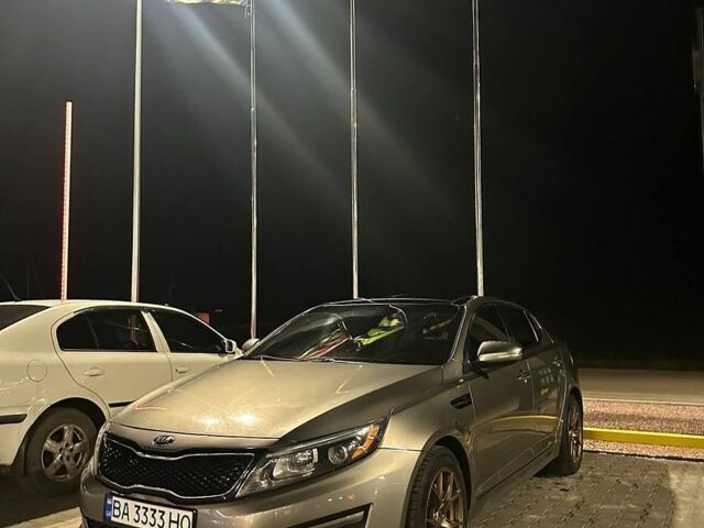 Сірий Кіа Оптіма, об'ємом двигуна 2.4 л та пробігом 185 тис. км за 10000 $, фото 1 на Automoto.ua