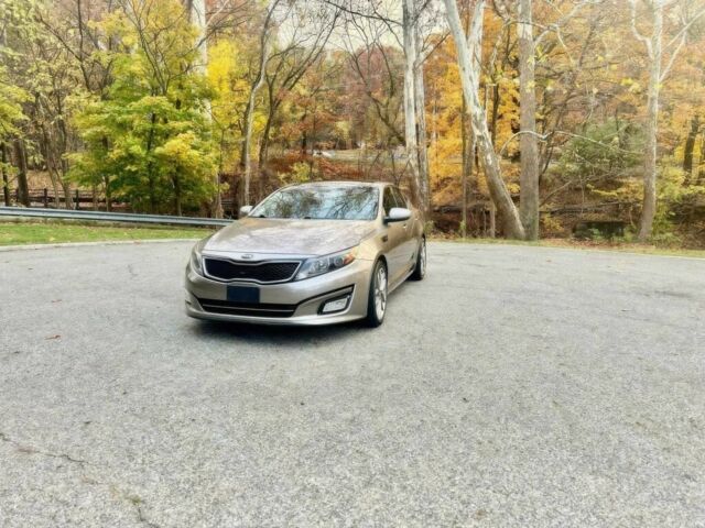 Сірий Кіа Оптіма, об'ємом двигуна 2 л та пробігом 77 тис. км за 8700 $, фото 1 на Automoto.ua