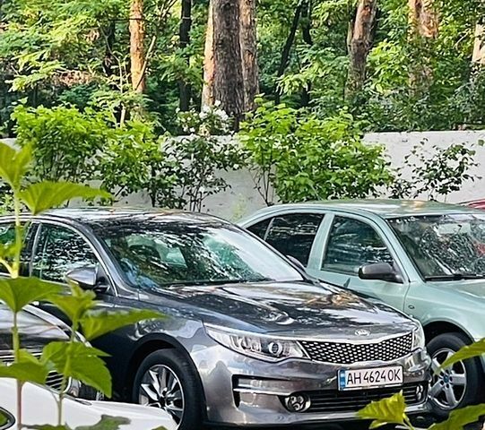 Серый Киа Оптима, объемом двигателя 1.7 л и пробегом 150 тыс. км за 13500 $, фото 1 на Automoto.ua