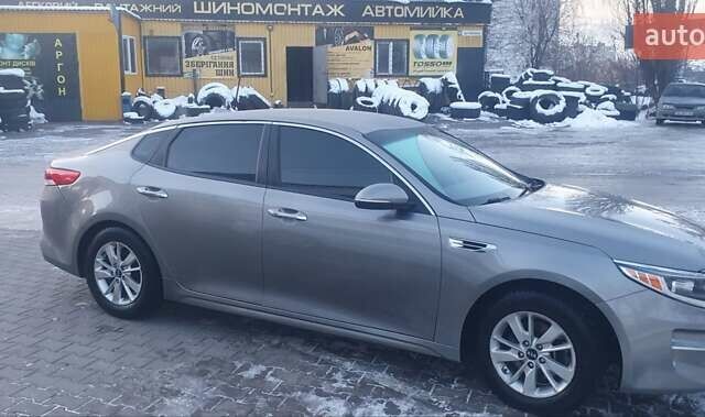Сірий Кіа Оптіма, об'ємом двигуна 2.36 л та пробігом 150 тис. км за 10850 $, фото 1 на Automoto.ua
