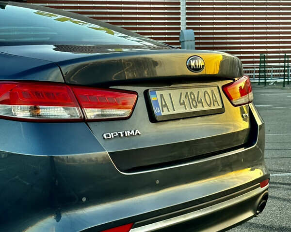 Серый Киа Оптима, объемом двигателя 2.36 л и пробегом 198 тыс. км за 12300 $, фото 1 на Automoto.ua