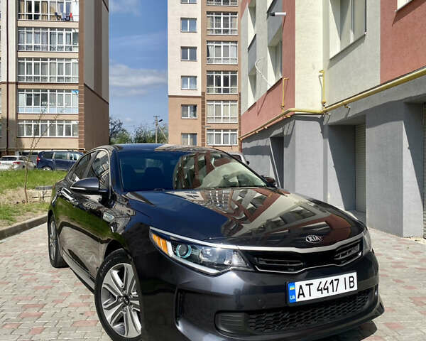 Сірий Кіа Оптіма, об'ємом двигуна 2 л та пробігом 210 тис. км за 13999 $, фото 1 на Automoto.ua