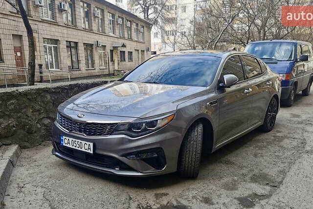 Сірий Кіа Оптіма, об'ємом двигуна 2 л та пробігом 100 тис. км за 13200 $, фото 1 на Automoto.ua