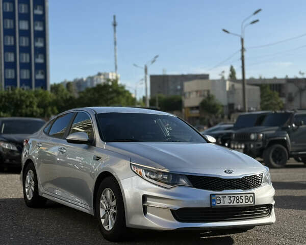 Сірий Кіа Оптіма, об'ємом двигуна 2.36 л та пробігом 185 тис. км за 9300 $, фото 1 на Automoto.ua