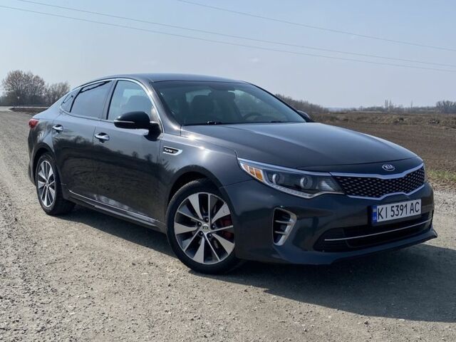 Сірий Кіа Оптіма, об'ємом двигуна 2 л та пробігом 143 тис. км за 12300 $, фото 1 на Automoto.ua