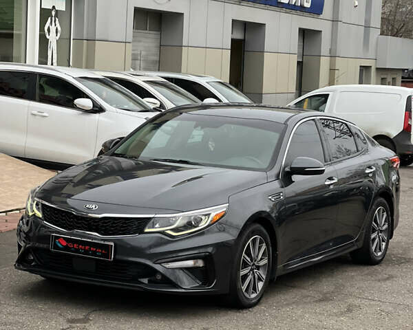 Серый Киа Оптима, объемом двигателя 1.59 л и пробегом 119 тыс. км за 13800 $, фото 1 на Automoto.ua