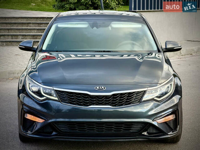 Сірий Кіа Оптіма, об'ємом двигуна 2.36 л та пробігом 185 тис. км за 14700 $, фото 1 на Automoto.ua