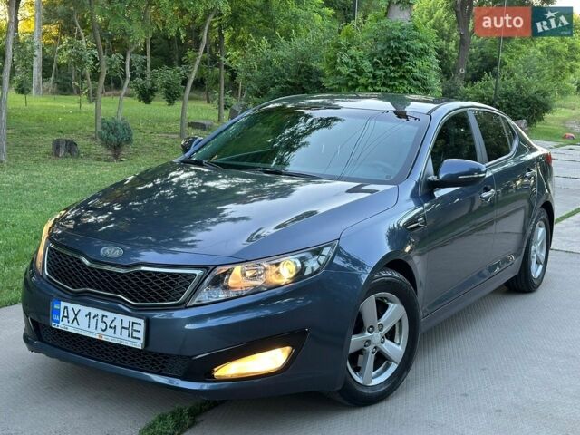 Синій Кіа Оптіма, об'ємом двигуна 2.36 л та пробігом 170 тис. км за 7999 $, фото 1 на Automoto.ua