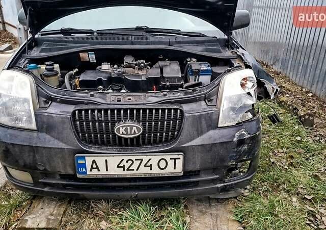 Чорний Кіа Піканто, об'ємом двигуна 1.09 л та пробігом 233 тис. км за 2000 $, фото 1 на Automoto.ua