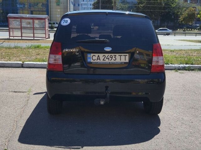 Чорний Кіа Піканто, об'ємом двигуна 1.09 л та пробігом 217 тис. км за 3400 $, фото 1 на Automoto.ua