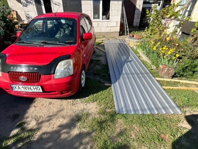 Красный Киа Пиканто, объемом двигателя 1.1 л и пробегом 200 тыс. км за 2126 $, фото 1 на Automoto.ua