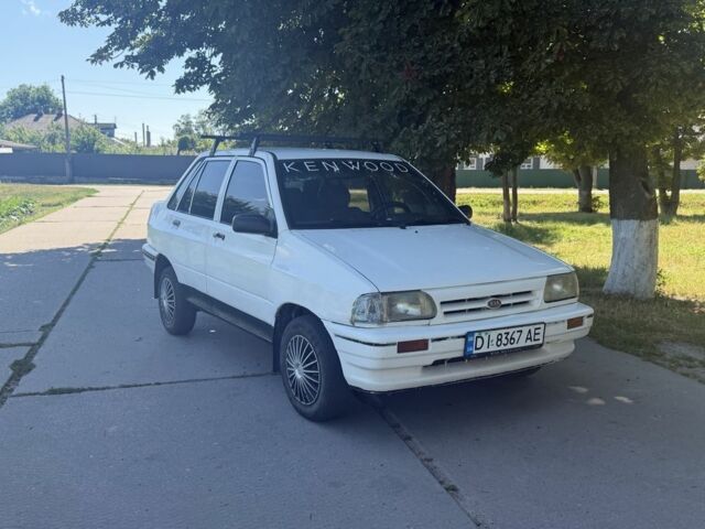 Белый Киа Прайд, объемом двигателя 1.3 л и пробегом 105 тыс. км за 750 $, фото 1 на Automoto.ua