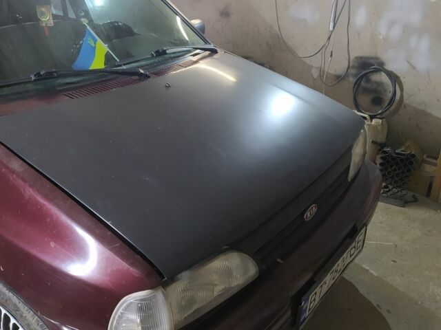 Красный Киа Прайд, объемом двигателя 1.3 л и пробегом 238 тыс. км за 1300 $, фото 1 на Automoto.ua