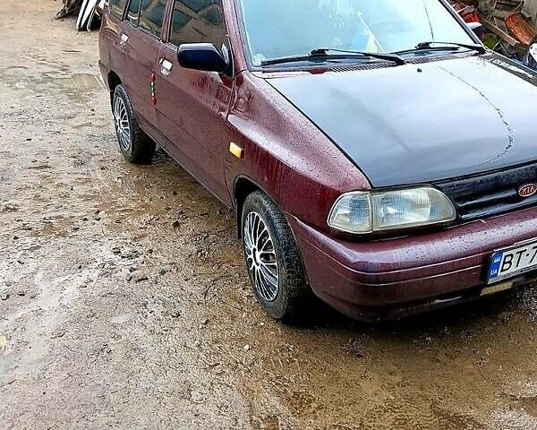 Червоний Кіа Прайд, об'ємом двигуна 1.3 л та пробігом 200 тис. км за 1350 $, фото 1 на Automoto.ua