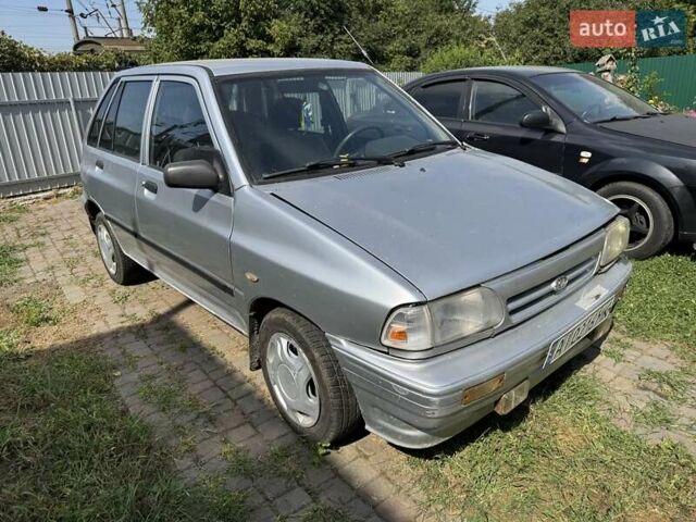 Серый Киа Прайд, объемом двигателя 1.3 л и пробегом 266 тыс. км за 600 $, фото 1 на Automoto.ua
