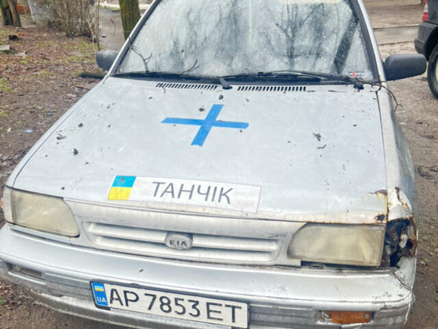 Серый Киа Прайд, объемом двигателя 1.3 л и пробегом 200 тыс. км за 550 $, фото 1 на Automoto.ua