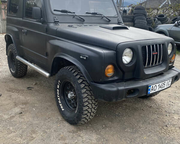 Черный Киа Ретона, объемом двигателя 2 л и пробегом 80 тыс. км за 6500 $, фото 1 на Automoto.ua